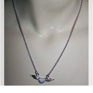 Exquisite
Silver Color Wings w/
Rhinestones Necklace